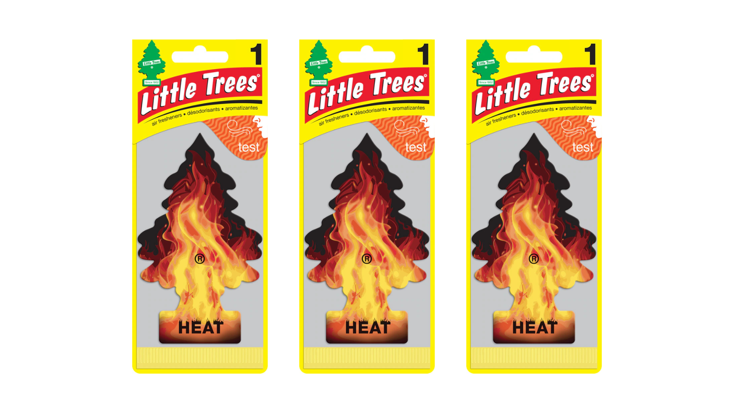 Three packages of Little Trees heat air fresheners on a white background
