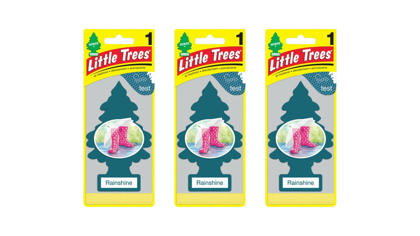 Three packages of Little Trees Rainshine air fresheners on a white background