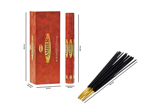 Amber incense sticks with packaging on a white background