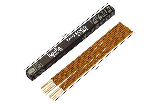 Incense sticks with their packaging on a white background