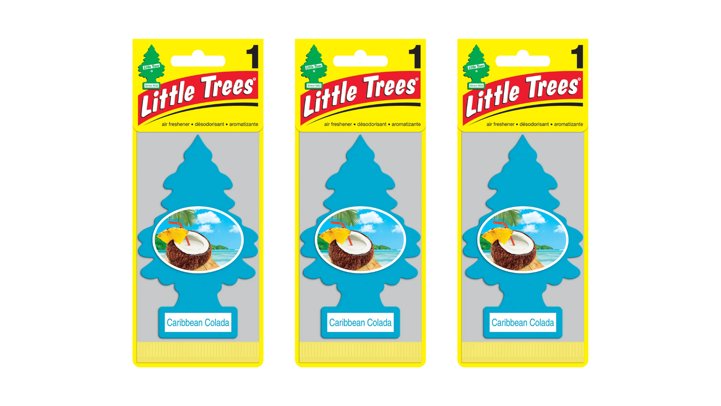 Three packages of Little Trees Caribbean Coconut air freshener on a white background