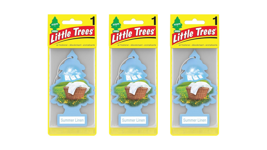 Three packages of Little Trees air fresheners on a white background