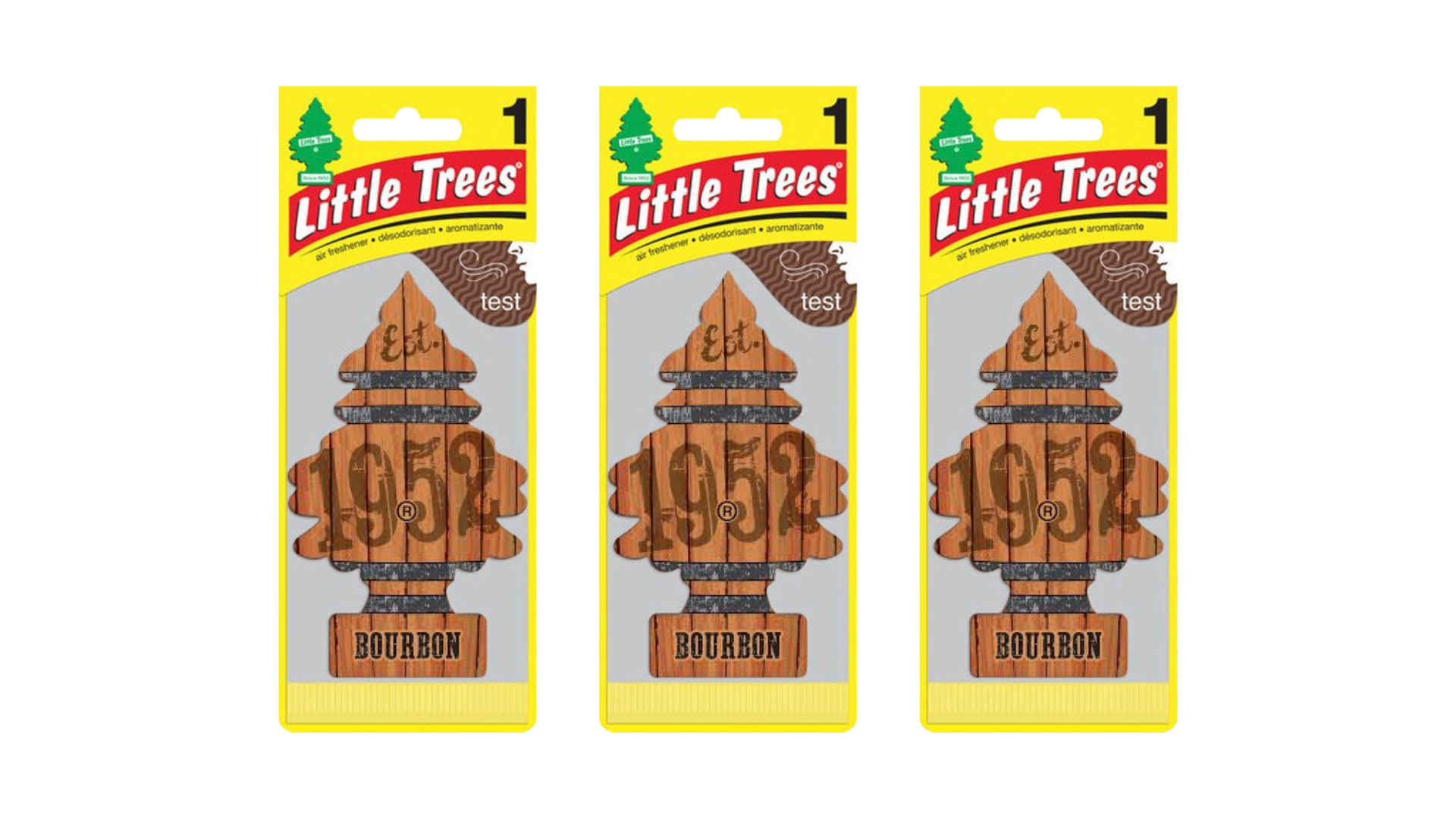 Three packages of Little Trees 1952 Bourbon air fresheners on a white background