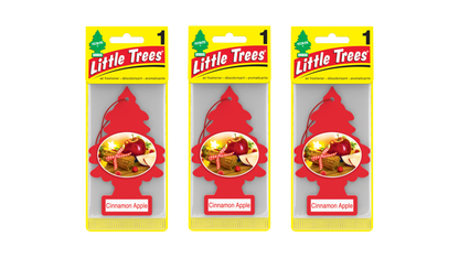 Three packages of Little Trees Cinnamon Apple air fresheners on a white background
