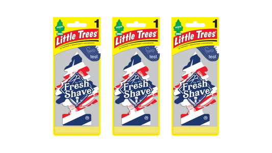 Three packages of Little Trees Fresh Shave air freshener on a white background
