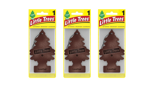 Three packages of Little Trees air fresheners on a white background