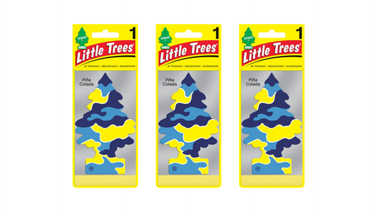 Three packages of Little Trees air fresheners on a white background