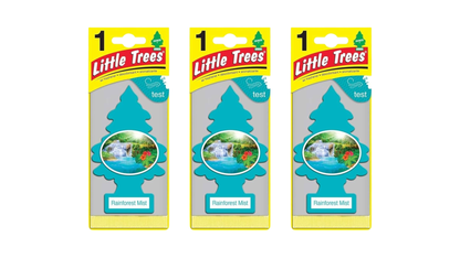 Three packages of Little Trees car air fresheners on a white background