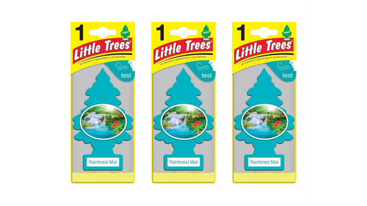 Three packages of Little Trees car air fresheners on a white background