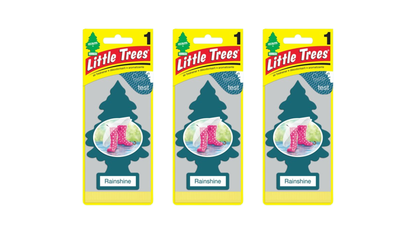 Three packages of Little Trees Rainshine air fresheners on a white background