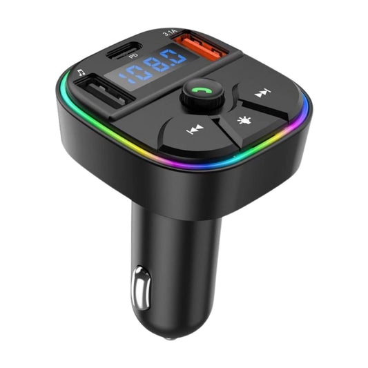 Black FM transmitter with ports, buttons, and light surrounding the display on a white background.