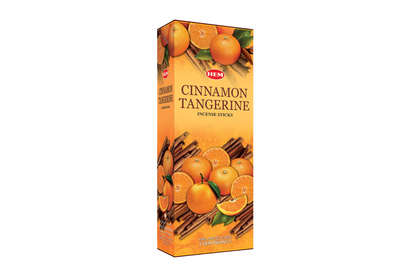 Box of HEM Cinnamon Tangerine incense sticks with cinnamon sticks and oranges on a white background