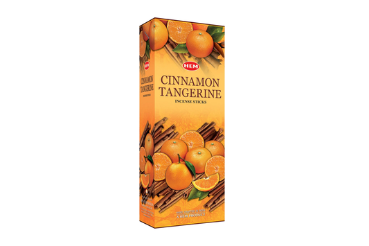 Box of HEM Cinnamon Tangerine incense sticks with cinnamon sticks and oranges on a white background
