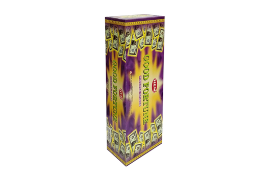 Purple and yellow box of incense sticks on a white background