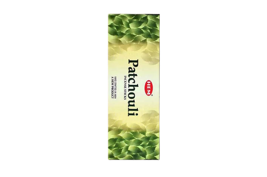 Patchouli incense stick packaging with green leaf design on a white background