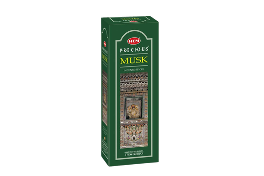 Green box of HEM Precious Musk incense sticks on a white background