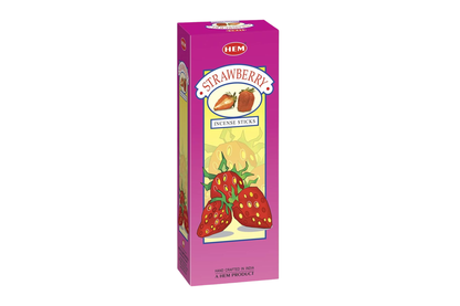 Pink box of strawberry-flavored incense sticks on a white background