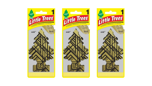Three packages of Little Trees air fresheners on a white background