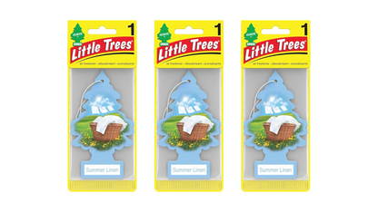 Three packages of Little Trees air fresheners on a white background