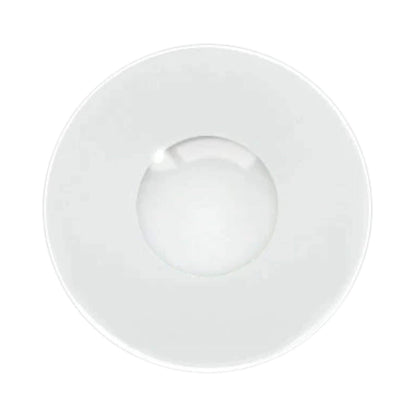 A white circular contact lens on a solid white background.