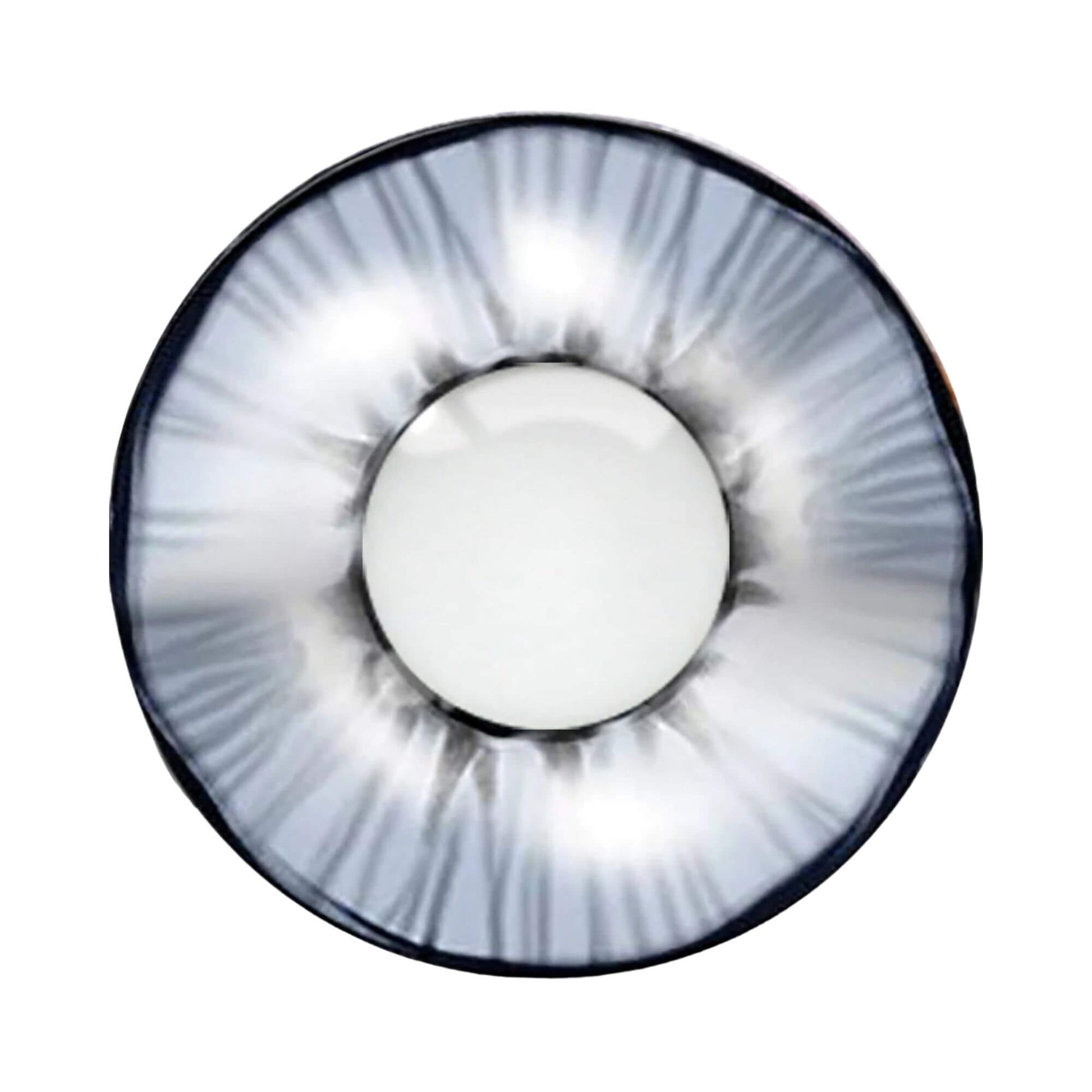Contact lens with a white design and black rim on a white background.