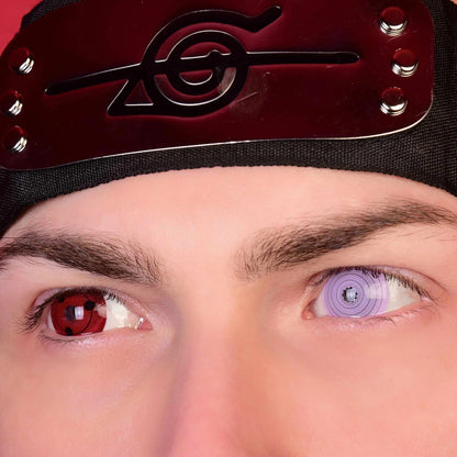 Close-up of a person wearing a cap with a logo, focusing on their eyes with colored lenses.